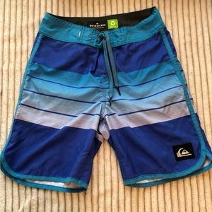 Boys Quiksilver board shorts. Waist size 24.